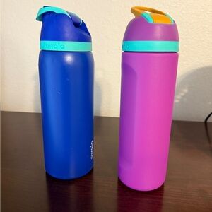 Owala Blue and Pink Water Bottles